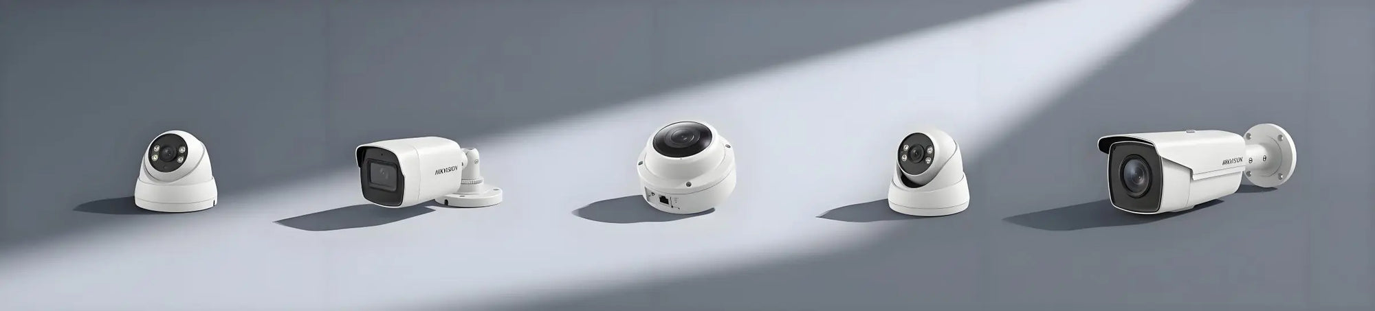 A studio display of 8MP Ultra HD IP cameras with Smart Hybrid Light and ColorVu technology, provided by Arlington CCTV for high-end residential and business security in the Chicago area