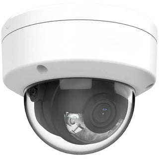 DS-2CD1147G2-LUF 4MP ColorVu dome camera with built-in mic monitoring a commercial building entrance after dark.
