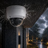 DS-2CD2147G2-LSU outdoor dome camera with IP67 weatherproof and IK10 vandal-resistant protection operating during heavy rain