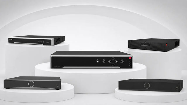 Professional network video recorder collection displayed on white podiums with multiple NVR chassis sizes and front-panel designs